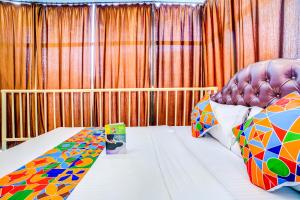 Letto o letti in una camera di FabExpress Nest - Nr Park Street Metro Station