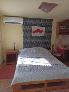 Posteľ alebo postele v izbe v ubytovaní Ginkgo Apartman
