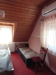 Posteľ alebo postele v izbe v ubytovaní Ginkgo Apartman