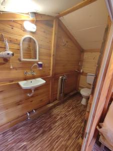 a bathroom with a sink and a toilet at Makara camp in Şarköy