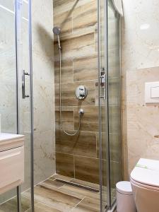 Koupelna v ubytování Hotel NPL CODE + 37 fotografií