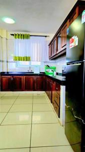 Una cocina o zona de cocina en 2BR, AC, Nyali, 2 min to the beach