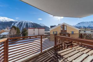 a balcony with a view of the mountains at Chesa Roser - Samedan in Samedan