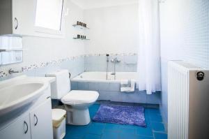 A bathroom at Villa Fotini with ocean view