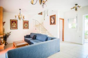 A seating area at Villa Fotini with ocean view