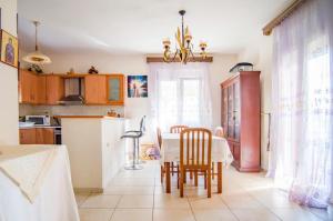 A kitchen or kitchenette at Villa Fotini with ocean view