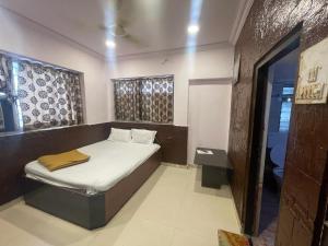 Een bed of bedden in een kamer bij LaStay Hotel
