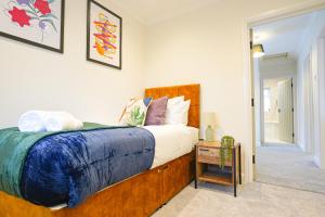 Katil atau katil-katil dalam bilik di Southampton 3 Bedroom Luxury House