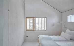 Postel nebo postele na pokoji v ubytování TIROLER TRIS Full House 10 beds