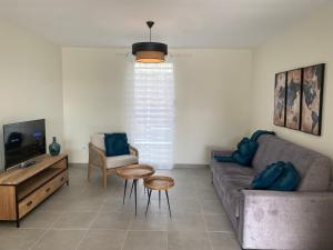 TV o dispositivi per l'intrattenimento presso CARIBBEAN RESIDENCE