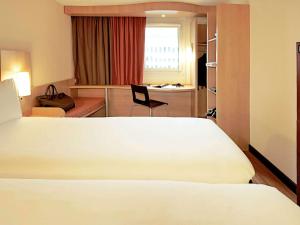 Postel nebo postele na pokoji v ubytování ibis Limoges Centre