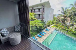 Bazén v ubytování Wyndham Tamansari Jivva Resort Bali nebo v jeho okolí