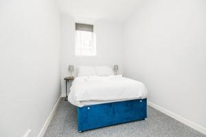 Katil atau katil-katil dalam bilik di Bright beautiful flat in Dundee