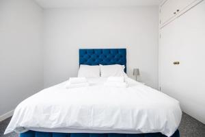 Katil atau katil-katil dalam bilik di Bright beautiful flat in Dundee