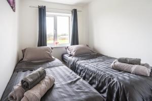 Cama o camas de una habitación en Riversfield Stay