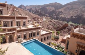 an aerial view of a house with a swimming pool at Eden Boutique Hotel in Tamellalt