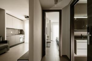 Kuchyň nebo kuchyňský kout v ubytování The Sliema Suites