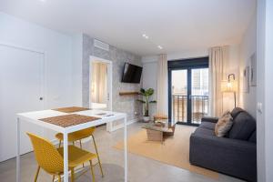 TV a/nebo společenská místnost v ubytování Apartamentos 7 dreams