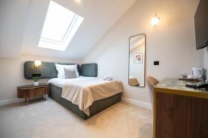Ένα ή περισσότερα κρεβάτια σε δωμάτιο στο Boem Exclusive Rooms Skadarlija