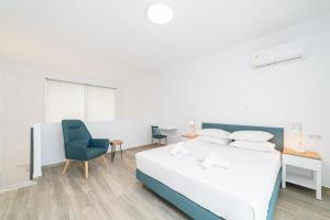Voodi või voodid majutusasutuse Olympiada Residential Complex & Villas toas