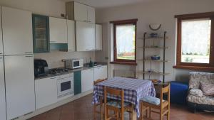 Η κουζίνα ή μικρή κουζίνα στο Appartamenti Nido d'Aquila