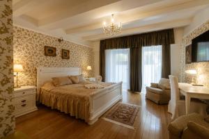 Postel nebo postele na pokoji v ubytování Allegro Hotel