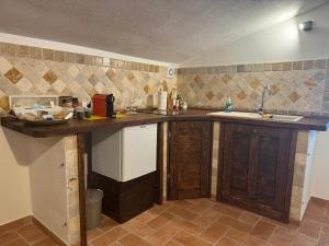 Kuchyň nebo kuchyňský kout v ubytování Casa Garoselli