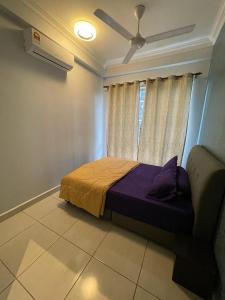 Postel nebo postele na pokoji v ubytování BSP 21 Saujana Putra Leisure Suites