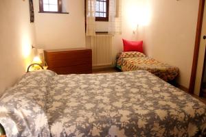 Ένα ή περισσότερα κρεβάτια σε δωμάτιο στο Casa Ancient Charm