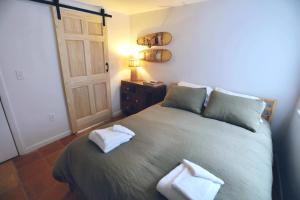 Cama ou camas em um quarto em West Branch 75, Waterville Valley