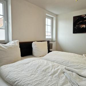 Ein Bett oder Betten in einem Zimmer der Unterkunft DM Hotels & Apartments - Apartment Pfarrgasse 09