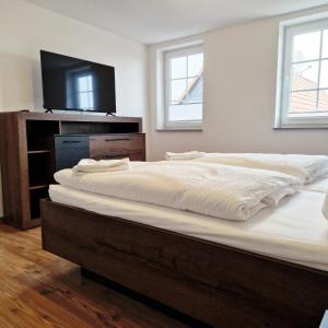 Ein Bett oder Betten in einem Zimmer der Unterkunft DM Hotels & Apartments - Apartment Pfarrgasse 09