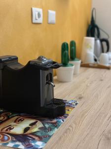 Příslušenství pro přípravu čaje a kávy v ubytování O munti rooms