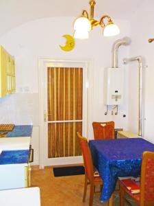 Posteľ alebo postele v izbe v ubytovaní Arany Barokk Apartman + 22 fotografií