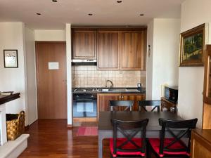 A kitchen or kitchenette at Stella delle Rocche House