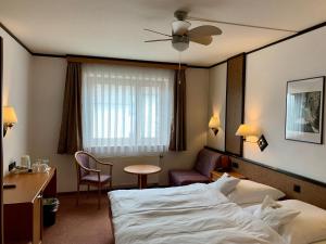 Postel nebo postele na pokoji v ubytování Hotel Seebach