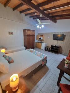 Postel nebo postele na pokoji v ubytování Hotel Hassler