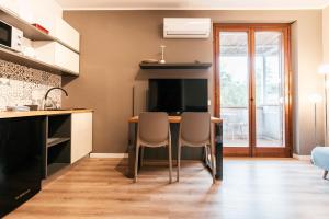 Kuchyň nebo kuchyňský kout v ubytování Mistral Apartments