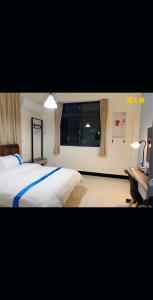 Letto o letti in una camera di 塔斯汀精品民宿