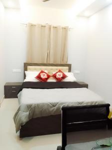 Ліжко або ліжка в номері Private Paradise Opposite Nandi Hills