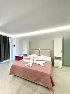 Postel nebo postele na pokoji v ubytování Seremetis Apartments Arillas