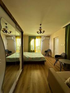 Postel nebo postele na pokoji v ubytování Guest House Maia