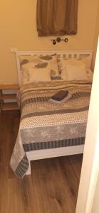 Posteľ alebo postele v izbe v ubytovaní Paradise Apartmanház