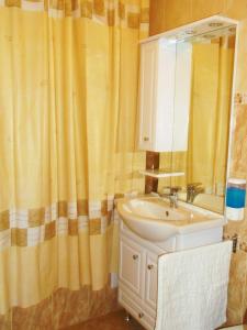 Kúpeľňa v ubytovaní Arany Barokk Apartman