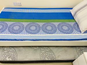 Voodi või voodid majutusasutuse Serene Nest toas