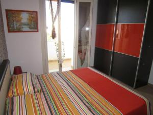 Postel nebo postele na pokoji v ubytování Cozy apartment in Gagliano del Capo 60 m² with spacious balcony