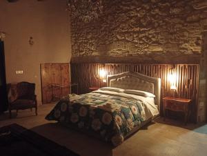 Postel nebo postele na pokoji v ubytování Agriturismo Tenuta Filippi