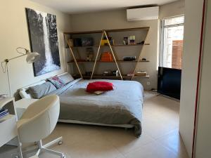 Posteľ alebo postele v izbe v ubytovaní Villa Galateias, un coin de Paradis, superbe vue avec piscine privée