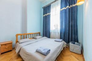 Posteľ alebo postele v izbe v ubytovaní Апартаменти 4-кімнатні в центрі, поруч Майдан Незалежності