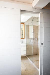 a bathroom with a shower with a glass door at MEIER Hilzhof in Hilzhofen